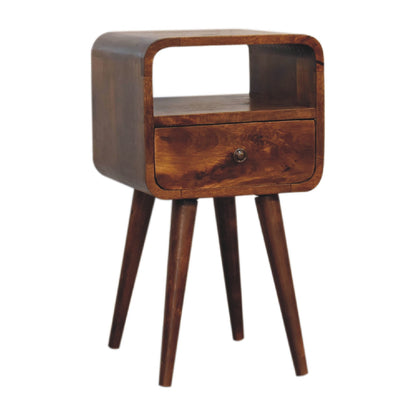 Chestnut mango wood bedside table side view with one small drawer and open slot at the top on a white background