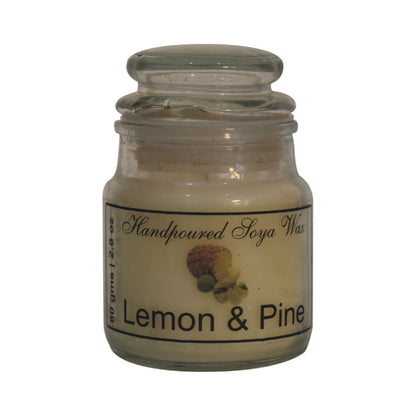 lemon and pine scented candle on a white background