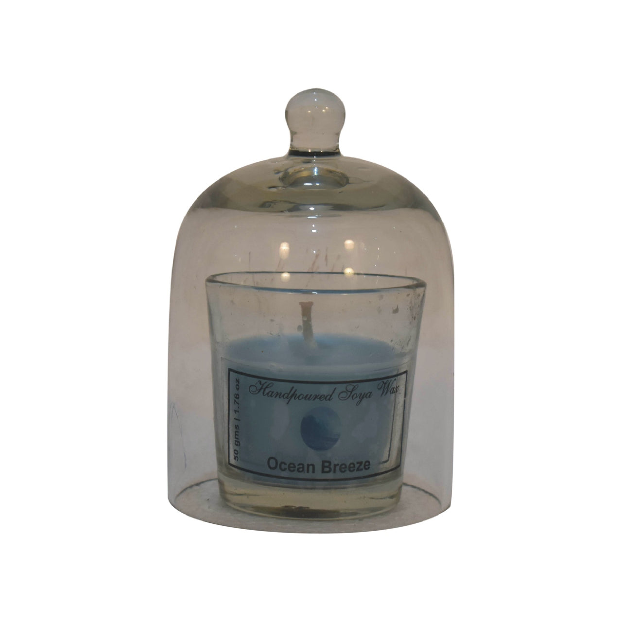 Ocean brezze candle in a glass dome with white background